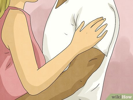 Graze his lower back unexpectedly or run a finger down his arm.