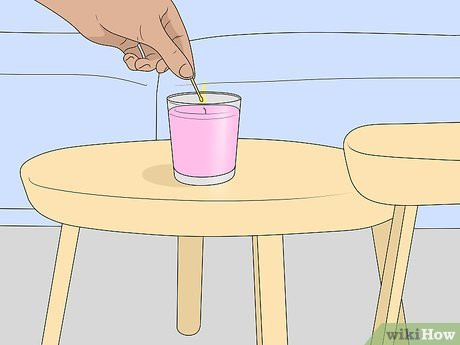 Step 4 Light a scented candle 45 minutes before your boyfriend comes over.
